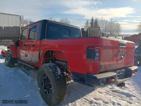 2020 Jeep Gladiator Rubicon with VIN 1C6JJTBG0LL138631, listed as a Copart auction lot 46883035 with 58,067 mi miles and Salvage Title. Bid and sale history available at carsss.com. Image 2.