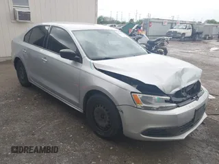 2014 Volkswagen Jetta S z VIN 3VW2K7AJ0EM251458, wystawiony jako IAAI lot #41894414 z przebiegiem 121 344 mil mil oraz . Historia ofert i sprzedaży dostępna na DreamBid. Obrazek 1.