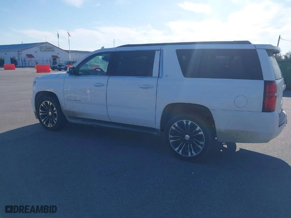 2015 Chevrolet Suburban LT with VIN 1GNSCJKC3FR525076, listed as a IAAI auction lot 41708913 with NaN miles. Bid and sale history available at carsss.com. Image 14.