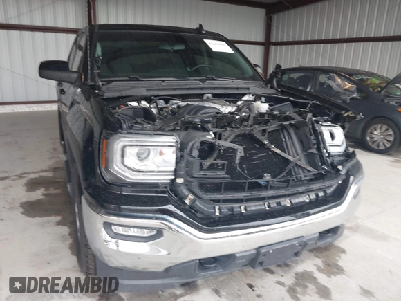 2017 GMC Sierra 1500 SLE z VIN 1GTV2MEC2HZ324763, wystawiony jako IAAI lot #42234082 z przebiegiem 106 984 mil mil oraz . Historia ofert i sprzedaży dostępna na DreamBid. Obrazek 6.