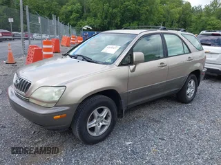 2002 Lexus RX 300 with VIN JTJGF10U220135180, listed as a IAAI auction lot 42646437 with 184,559 mi miles and . Bid and sale history available at DreamBid. Image 2.