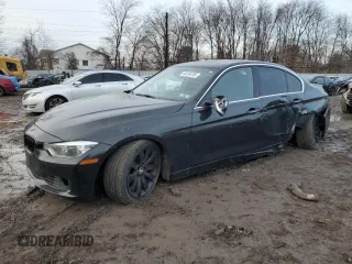 2018 BMW 3 Series 330i xDrive with VIN WBA8D9G59JNU67285, listed as a Copart auction lot 88704785 with 65,853 mi miles and Salvage title. Bid and sale history available at DreamBid. Image 1.
