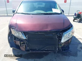 2012 Honda Odyssey EX with VIN 5FNRL5H42CB136915, listed as a IAAI auction lot 41972714 with 211,729 mi miles and . Bid and sale history available at carsss.com. Image 6.