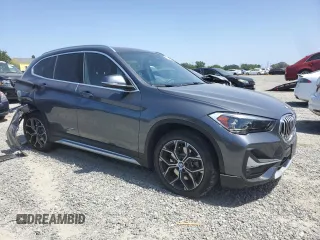 2020 BMW X1 xDrive28i с VIN WBXJG9C06L5R54942, выставлен на аукционе Copart как лот 54262435 с пробегом 65 217 миль миль и Списание • Salvage title. История ставок и продаж доступна на DreamBid. Изображение 4.