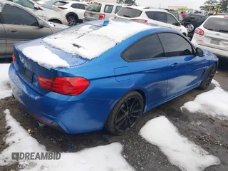 2017 BMW 4 Series 440i with VIN WBA4P1C50HK522098, listed as a IAAI auction lot 41282953 with 105,299 mi miles and . Bid and sale history available at carsss.com. Image 4.