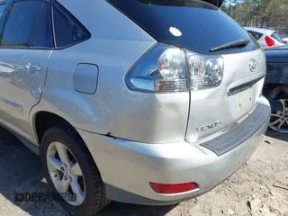 2008 Lexus RX with VIN 2T2HK31U98C061120, listed as a IAAI auction lot 42115282 with 176,867 mi miles. Bid and sale history available at carsss.com. Image 6.