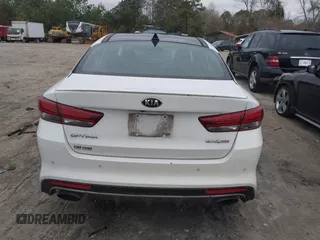 2016 Kia Optima SX Turbo with VIN 5XXGW4L26GG021476, listed as a IAAI auction lot 41737714 with 244,739 mi miles and . Bid and sale history available at carsss.com. Image 16.