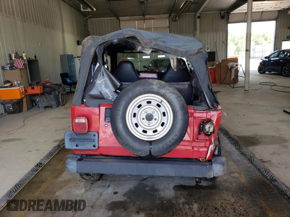 2001 Jeep Wrangler SE with VIN 1J4FA29P91P331908, listed as a Copart auction lot 55071675 with 142,004 mi miles and Salvage Title. Bid and sale history available at carsss.com. Image 6.