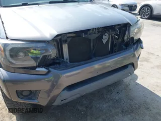 2013 Toyota Tacoma PreRunner z VIN 5TFJX4GN2DX018800, wystawiony jako IAAI lot #42304447 z przebiegiem 188 409 mil mil oraz . Historia ofert i sprzedaży dostępna na DreamBid. Obrazek 19.