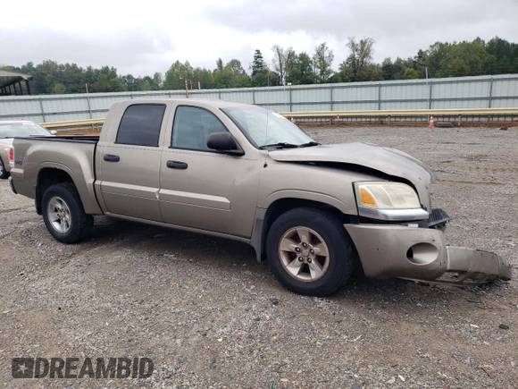 2006 Mitsubishi Raider z VIN 1Z3HT48N36S540902, wystawiony jako Copart lot #73397504 z przebiegiem 126 311 mil mil oraz Czysty tytuł • Clean title. Historia ofert i sprzedaży dostępna na DreamBid. Obrazek 4.