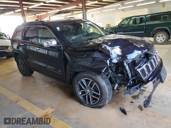 2018 Jeep Grand Cherokee Limited with VIN 1C4RJFBG9JC299621, listed as a Copart auction lot 61395695 with 87,952 mi miles and Salvage title. Bid and sale history available at DreamBid. Image 4.
