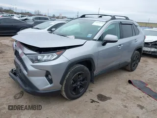 2021 Toyota RAV4 XLE with VIN 2T3W1RFVXMC148125, listed as a IAAI auction lot 41645741 with 66,047 mi miles. Bid and sale history available at carsss.com. Image 18.