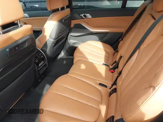 2021 BMW X7 M50i with VIN 5UXCX6C07M9G39230, listed as a IAAI auction lot 41409366 with 63,965 mi miles. Bid and sale history available at carsss.com. Image 8.