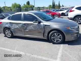 2016 Kia Optima LX with VIN 5XXGT4L33GG106342, listed as a IAAI auction lot 42272945 with 94,645 mi miles and . Bid and sale history available at DreamBid. Image 13.