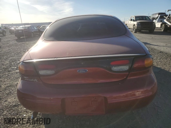 1997 Ford Taurus GL z VIN 1FALP52U6VA301952, wystawiony jako Copart lot #74245204 z przebiegiem 152 562 mil mil oraz Szkoda całkowita • Salvage title. Historia ofert i sprzedaży dostępna na DreamBid. Obrazek 6.