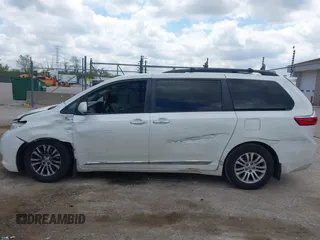 2016 Toyota Sienna XLE with VIN 5TDYK3DC4GS702638, listed as a IAAI auction lot 42255793 with 124,977 mi miles and . Bid and sale history available at DreamBid. Image 14.