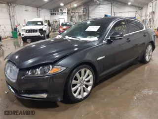 2013 Jaguar XF V6 SC with VIN SAJWJ0EF3D8S90652, listed as a IAAI auction lot 41595726 with 110,880 mi miles. Bid and sale history available at carsss.com. Image 2.