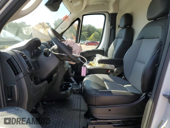 2023 Ram ProMaster Cargo with VIN 3C6LRVAG7PE583784, listed as a Copart auction lot 73926394 with 33,434 mi miles and Salvage Title. Bid and sale history available at DreamBid. Image 7.