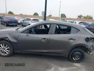 2015 Mazda 3 i Touring with VIN JM1BM1L7XF1261134, listed as a IAAI auction lot 42164554 with 130,570 mi miles and . Bid and sale history available at DreamBid. Image 15.