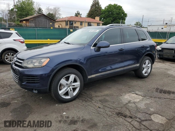 2011 Volkswagen Touareg Lux z VIN WVGFK9BP4BD001551, wystawiony jako Copart lot #58743065 z przebiegiem 142 661 mil mil oraz Szkoda całkowita • Salvage title. Historia ofert i sprzedaży dostępna na DreamBid. Obrazek 1.