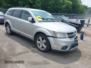 2012 Dodge Journey SXT z VIN 3C4PDCBGXCT324756, wystawiony jako IAAI lot #42422533 z przebiegiem 241 934 mil mil oraz . Historia ofert i sprzedaży dostępna na DreamBid. Obrazek 1.