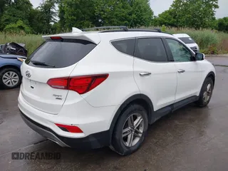 2017 Hyundai Santa Fe 2.4L with VIN 5XYZUDLB0HG397831, listed as a IAAI auction lot 42496341 with 96,333 mi miles and . Bid and sale history available at DreamBid. Image 4.