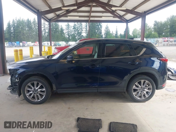 2019 Mazda CX-5 Grand Touring with VIN JM3KFBDM6K0522903, listed as a IAAI auction lot 42583005 with 61,174 mi miles and . Bid and sale history available at DreamBid. Image 15.