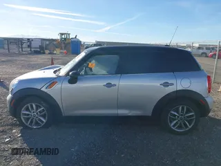 2012 MINI Countryman with VIN WMWZB3C59CWM05749, listed as a IAAI auction lot 38329304 with 64,590 mi miles and . Bid and sale history available at DreamBid. Image 14.