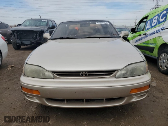 1995 Toyota Camry LE z VIN 4T1SK12EXSU529058, wystawiony jako Copart lot #49055255 z przebiegiem 166 029 mil mil oraz Szkoda całkowita • Salvage title. Historia ofert i sprzedaży dostępna na DreamBid. Obrazek 5.