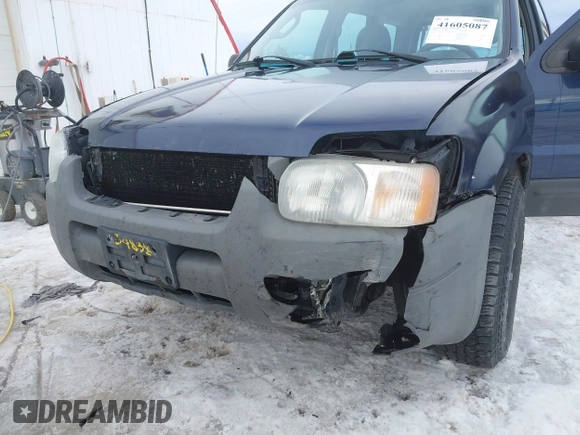 2003 Ford Escape XLS Popular with VIN 1FMYU92153KE01890, listed as a IAAI auction lot 41605087 with 109,411 mi miles. Bid and sale history available at carsss.com. Image 6.