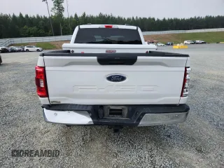 2021 Ford F-150 XL with VIN 1FTEW1C53MFB80059, listed as a Copart auction lot 58835805 with 85,998 mi miles and Salvage title. Bid and sale history available at DreamBid. Image 6.
