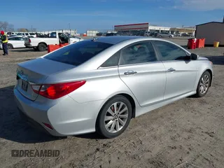 2014 Hyundai Sonata SE with VIN 5NPEC4ACXEH923397, listed as a IAAI auction lot 41748671 with 182,136 mi miles and . Bid and sale history available at DreamBid. Image 4.