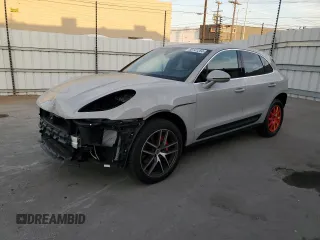 2023 Porsche Macan S z VIN WP1AG2A52PLB41097, wystawiony jako Copart lot #86141284 z przebiegiem 10 581 mil mil oraz Szkody całkowita. Historia ofert i sprzedaży dostępna na DreamBid. Obrazek 1.