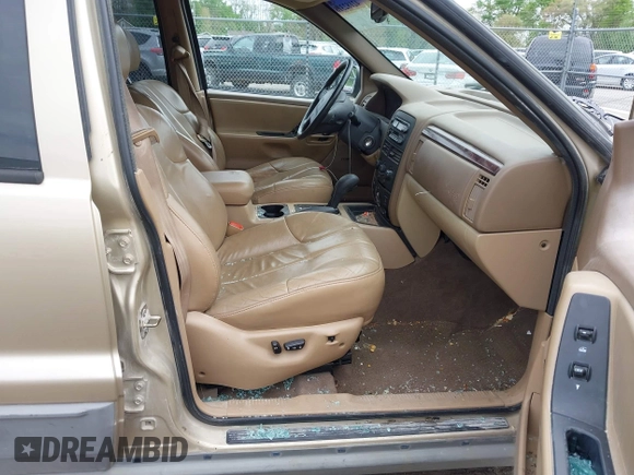 2000 Jeep Grand Cherokee Laredo with VIN 1J4GW48SXYC100248, listed as a IAAI auction lot 42182318 with 227,658 mi miles and . Bid and sale history available at DreamBid. Image 5.