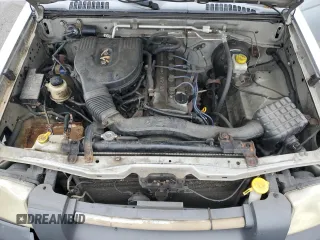 2002 Nissan Frontier z VIN 1N6DD26S92C319793, wystawiony jako Copart lot #59757445 z przebiegiem Nie podano mil oraz Czysty tytuł • Clean title. Historia ofert i sprzedaży dostępna na DreamBid. Obrazek 11.