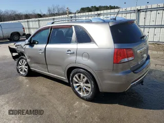 2012 Kia Sorento SX with VIN 5XYKW4A25CG212101, listed as a Copart auction lot 47440555 with 149,970 mi miles and Salvage Title. Bid and sale history available at carsss.com. Image 2.