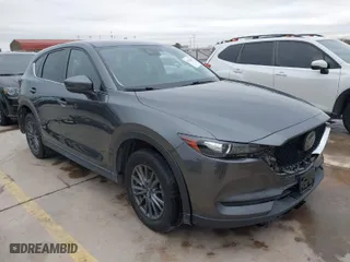 2021 Mazda CX-5 Touring with VIN JM3KFBCM0M0342210, listed as a IAAI auction lot 41236013 with 96,012 mi miles. Bid and sale history available at carsss.com. Image 1.