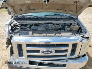 2009 Ford Econoline Passenger XL with VIN 1FBNE31L39DA56400, listed as a Copart auction lot 59878595 with 249,112 mi miles and Salvage title. Bid and sale history available at DreamBid. Image 12.