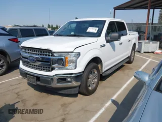 2019 Ford F-150 XL with VIN 1FTEW1C44KKC60773, listed as a IAAI auction lot 42706042 with 185,864 mi miles and . Bid and sale history available at DreamBid. Image 2.