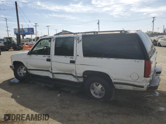 1997 Chevrolet Suburban with VIN 1GNEC16R5VJ301591, listed as a Copart auction lot 75965054 with 213,321 mi miles and Salvage Title. Bid and sale history available at carsss.com. Image 2.