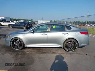 2017 Kia Optima z VIN KNAGT4LE2H5014899, wystawiony jako IAAI lot #42578989 z przebiegiem 110 363 mil mil oraz . Historia ofert i sprzedaży dostępna na DreamBid. Obrazek 14.