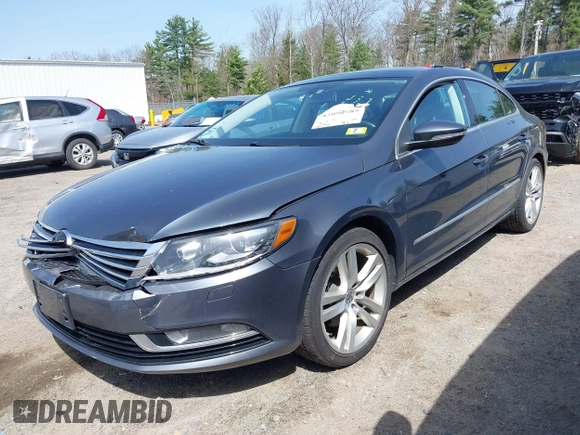 2014 Volkswagen CC Lux with VIN WVWRP7AN7EE501483, listed as a IAAI auction lot 42090985 with 121,737 mi miles. Bid and sale history available at carsss.com. Image 2.