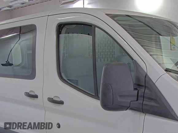 2018 Ford Transit z VIN 1FTYE1YM0JKB52111, wystawiony jako IAAI lot #42789026 z przebiegiem 132 936 mil mil oraz . Historia ofert i sprzedaży dostępna na DreamBid. Obrazek 38.