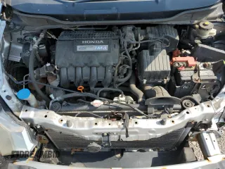 2010 Honda Insight EX with VIN JHMZE2H77AS015329, listed as a Copart auction lot 60502835 with 213,397 mi miles and Clean title. Bid and sale history available at DreamBid. Image 11.