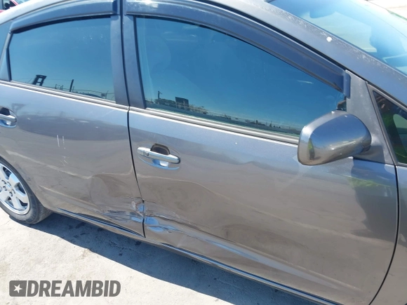 2007 Toyota Prius with VIN JTDKB20U073272767, listed as a IAAI auction lot 42520125 with 290,808 mi miles and . Bid and sale history available at DreamBid. Image 6.