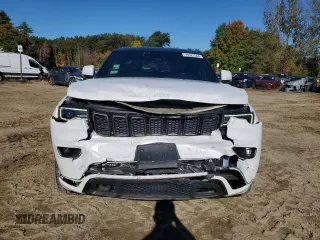 2017 Jeep Grand Cherokee Limited 75th Anniversary with VIN 1C4RJFBG5HC688475, listed as a Copart auction lot 75327564 with 76,830 mi miles and Salvage title. Bid and sale history available at DreamBid. Image 5.