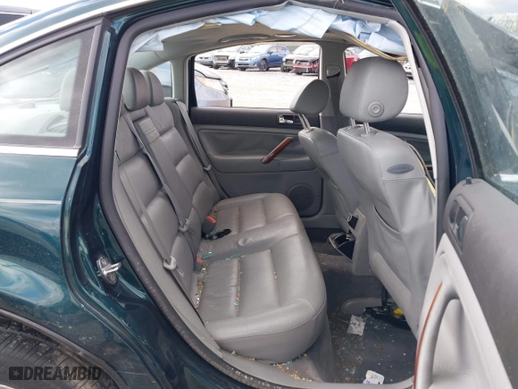 2001 Volkswagen Passat GLX with VIN WVWTH63B51E124484, listed as a IAAI auction lot 42043719 with 42,585 mi miles. Bid and sale history available at carsss.com. Image 8.