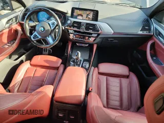 2021 BMW X4 M40i with VIN 5UX2V5C05M9F68427, listed as a Copart auction lot 64941095 with 50,208 mi miles and Salvage title. Bid and sale history available at DreamBid. Image 8.