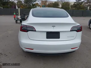2019 Tesla Model 3 Long Range with VIN 5YJ3E1EB2KF361541, listed as a IAAI auction lot 41859373 with 54,664 mi miles. Bid and sale history available at carsss.com. Image 17.
