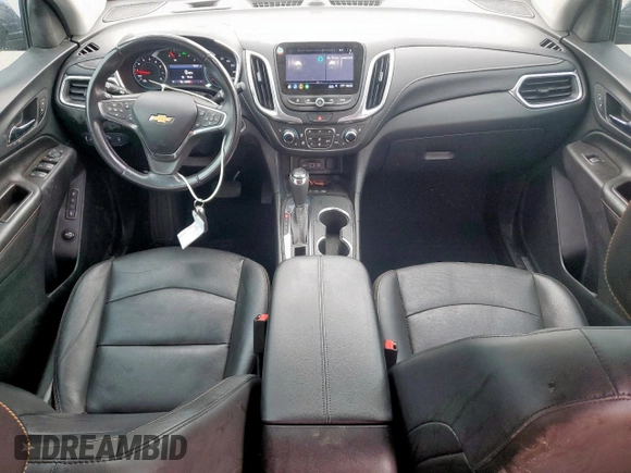 2021 Chevrolet Equinox Premier z VIN 2GNAXNEV9M6136701, wystawiony jako Copart lot #57288215 z przebiegiem 62 808 mil mil oraz Szkoda całkowita • Salvage title. Historia ofert i sprzedaży dostępna na DreamBid. Obrazek 8.